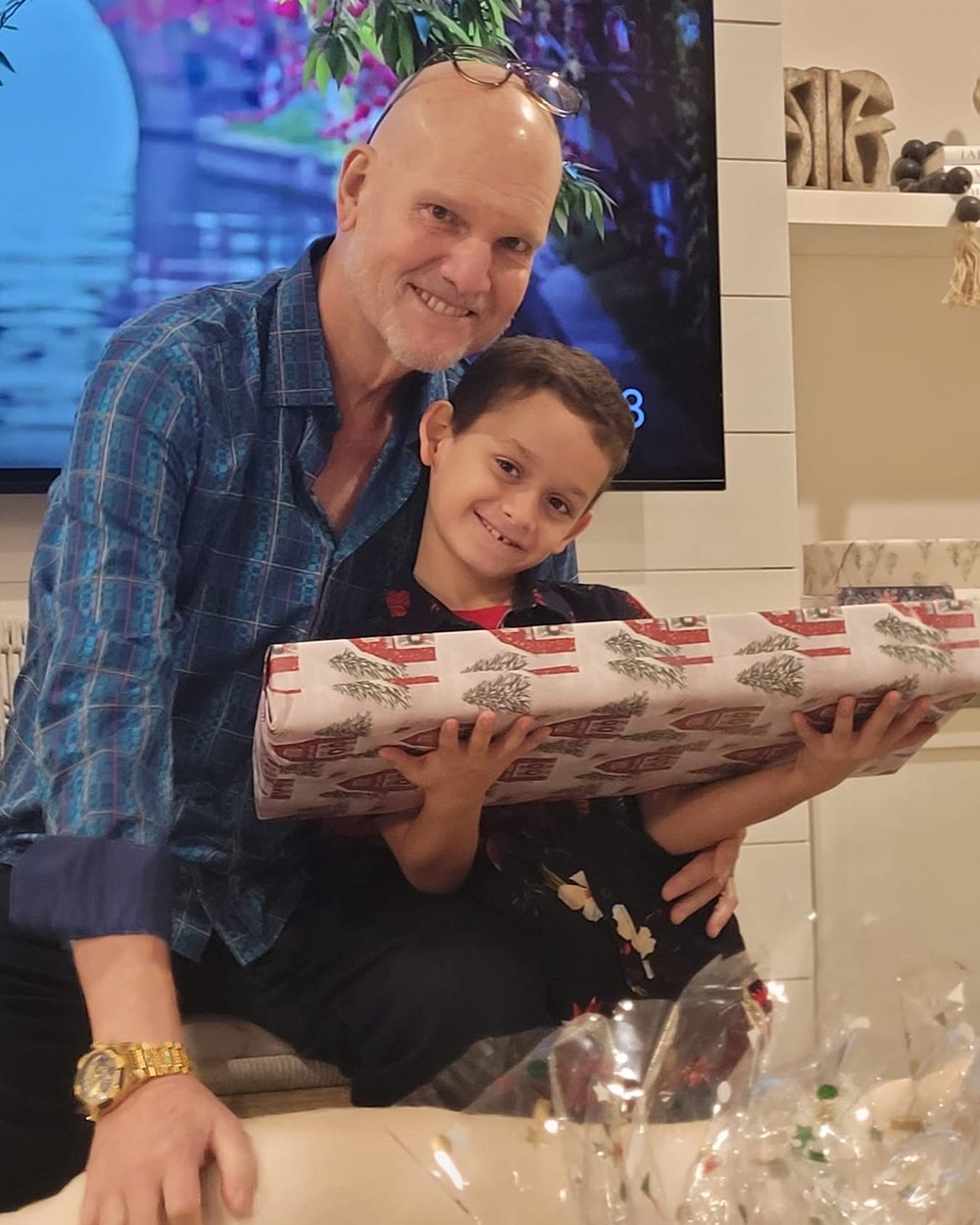 Lone Warrior Foundation founder Rob Chumbook delivering a holiday gift to a child